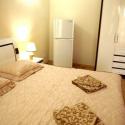 Готельний комплекс Анна Мария - номер с белой мебелью двуспальная кровать