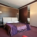 Готель VIP - резиденция - кровать в номере Апартамент тип 3